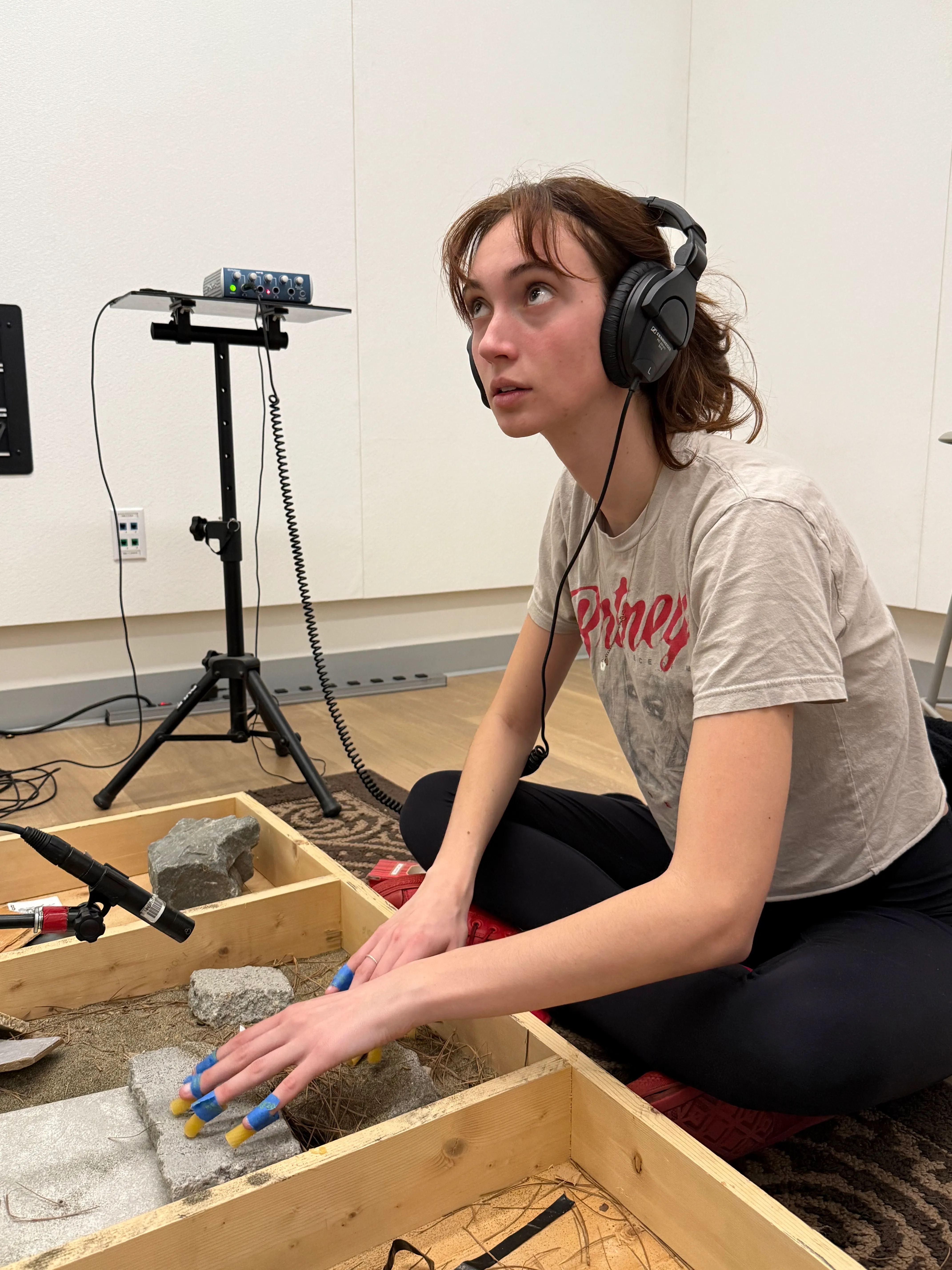 Madison focused on her performance while looking at TV.